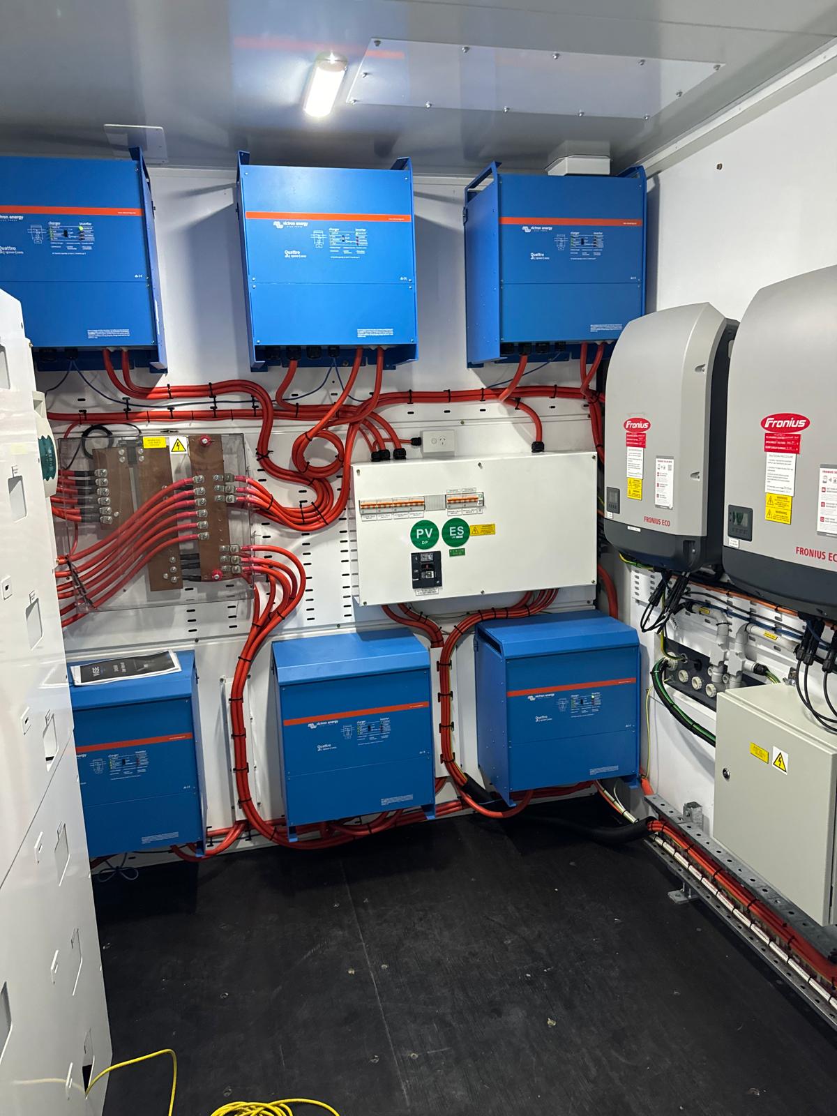 Victron Energy inverter bank inside an off-grid power room
